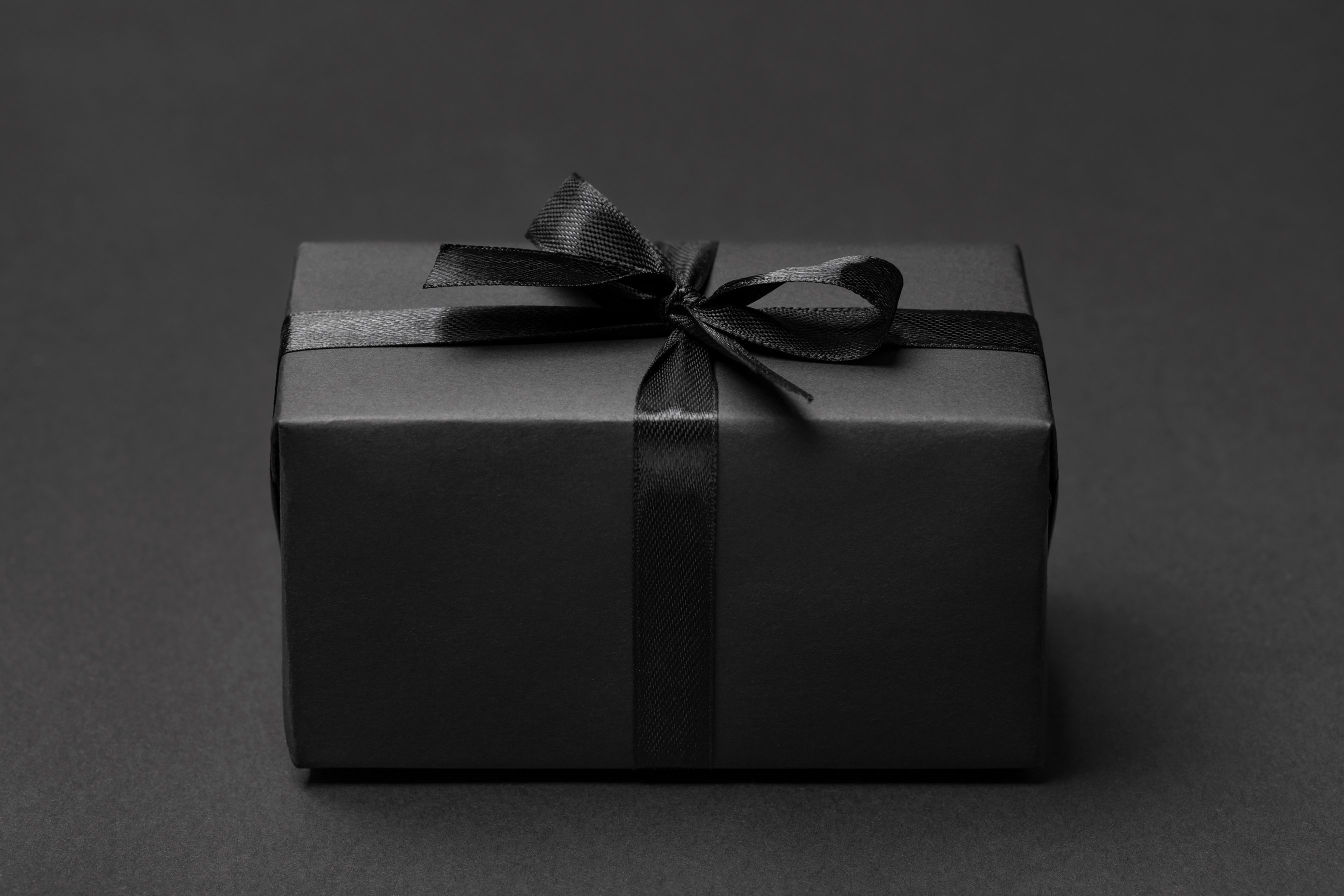 Black Gift box on dark background