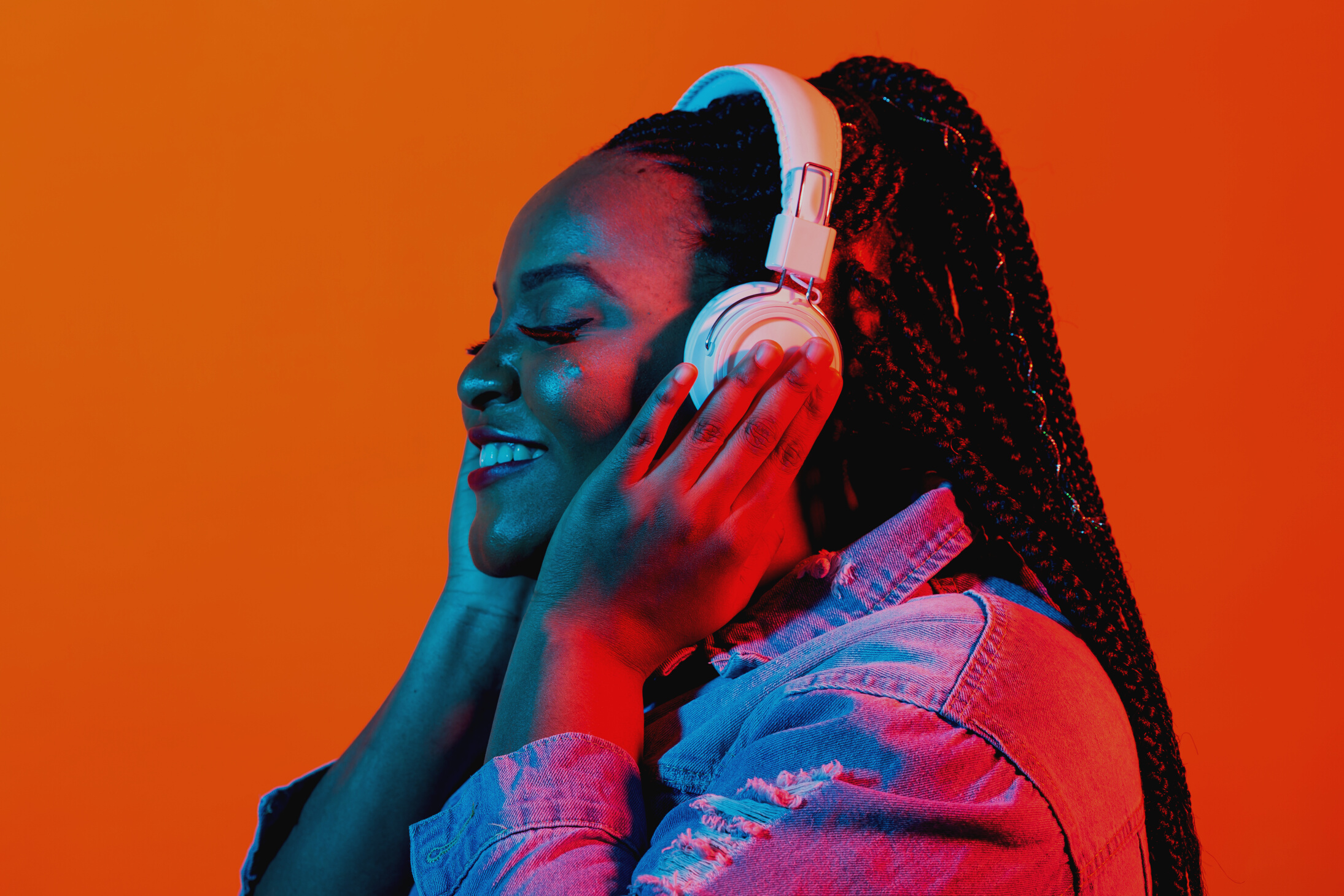 Neon Portrait of Young Black Woman Listen to Music in Headphones.